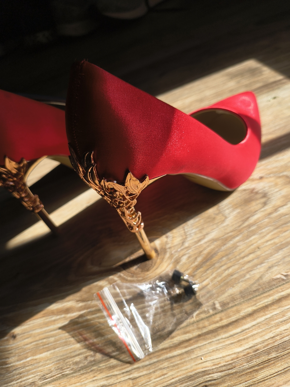 Red Satin Pointed-Toe Heels with Ornate Gold Stiletto